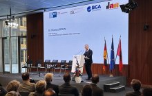 Begrüßungsrede von Dr. Thomas Steffen, Staatssekretär im Bundesministerium für Wirtschaft und Energie. Foto: A. Metz